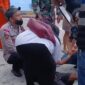 Korban Fransiskus Wero saat jatuh pingsan di Pelabuhan L.Sya Maumere, Minggu (5/4/2026). 
