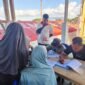 Proses pendaftaran pengungsi yang dengan sukarela ingin pulang, Minggu (23/8/2036) sore.