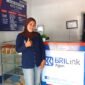 Rismawati di counter BRILink miliknya di Desa Waturia, Kecamatan Magepanda